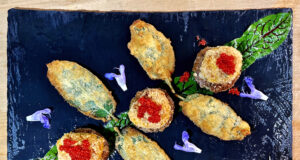 Pepite di halibut della Groenlandia con crostini di segale e salvia fritta