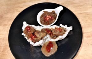 Stracotto di rognone alla birra rossa, con cioccolato fondente, cipolla rossa, zafferano e zenzero