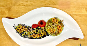 Stelle cometa con pesto di finocchietto selvatico e sautè di vongole