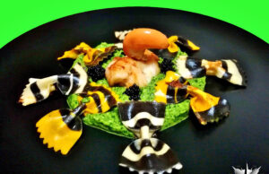 Farfalle tigrate con pesto di capesante e perle di mallotus