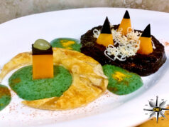 Mezzaluna di provola di Agerola con vellutata di riso Venere, mousse di basilico e colatura di alici