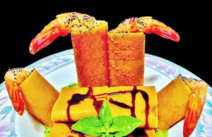 Totem di paccheri con mazzancolle dell’Atlantico e polpa di granchio