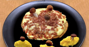 Porcino reale con fontina e culatello, pioppini e rösti alla curcuma