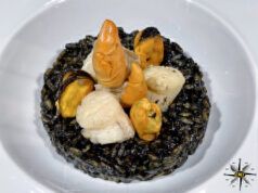 Risotto alla liquirizia con capesante in oliocottura e cozze fritte