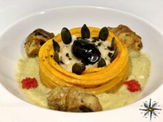 Spaghettoni di zucca con pesto di chayote, buccini e bolla di nero di seppia