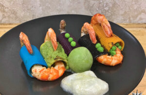 Policromia di paccheri con pisellini e code di gambero argentino