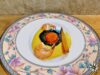 Tuorlo ad alta temperatura con spuma di aglio nero, cremoso di mais e gamberetti