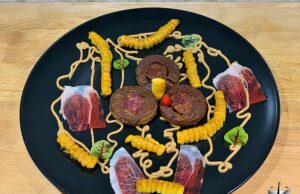 Tapas di gofio con Pata Negra, Chorizo, mais e maionese al cumino