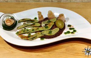 Foglie di ulivo al pesto taggiasco con storione bianco affumicato