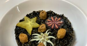 Risotto tristellato con stella alpina, carambola e anice stellato