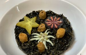 Risotto tristellato con stella alpina, carambola e anice stellato
