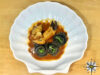 Tortelloni con polpa di granchio, bisque di gamberi e chela di granciporro