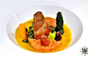 Schegge di ventricina con guayava, cavolo nero e pasta di aji amarillo