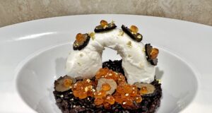 Riso al salto con burrata, tartufo, oro e caviale di salmone