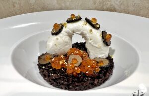 Riso al salto con burrata, tartufo, oro e caviale di salmone