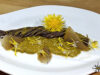 Spaghetti al nero di seppia con pesto di tarassaco e scaglie di aceto balsamico